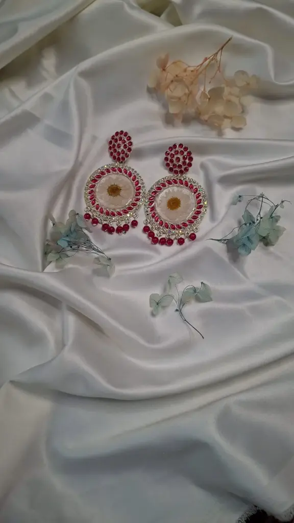 Ruby beads white resin earrings.