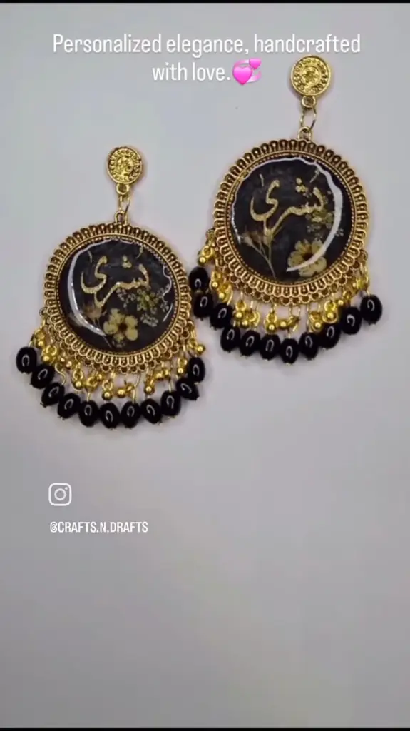Golden urdu calligraphic resin earring.