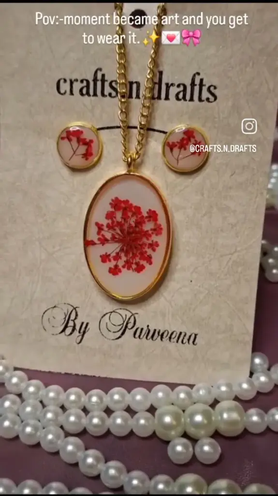 Golden framed red flowered resin pendant with earring ,Combo.