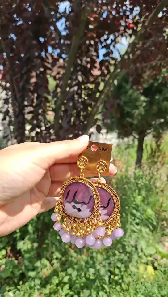 Urdu calligraphy resin earring.