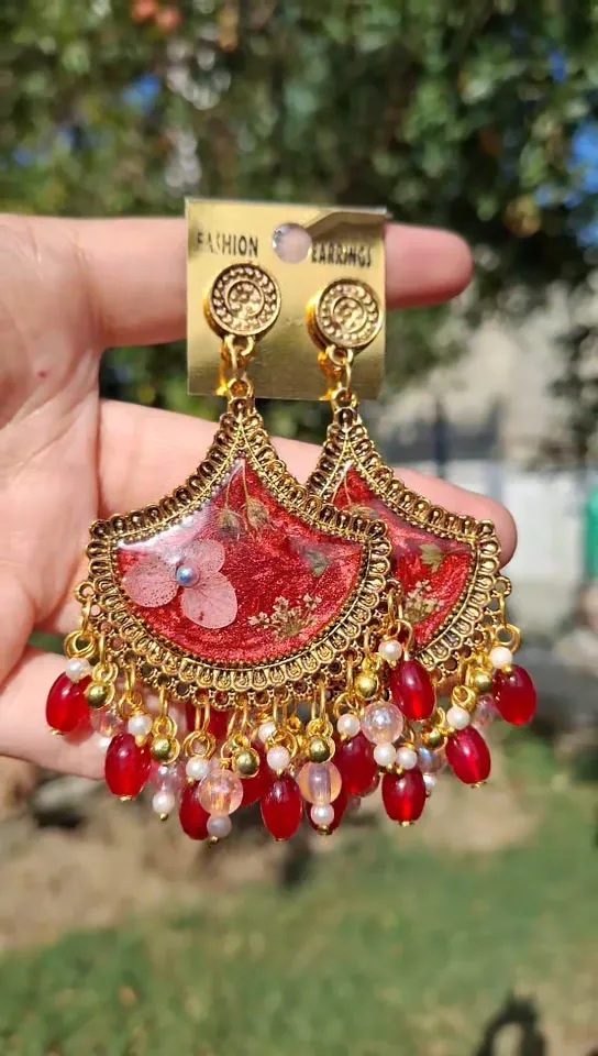 Red resin flower earring.